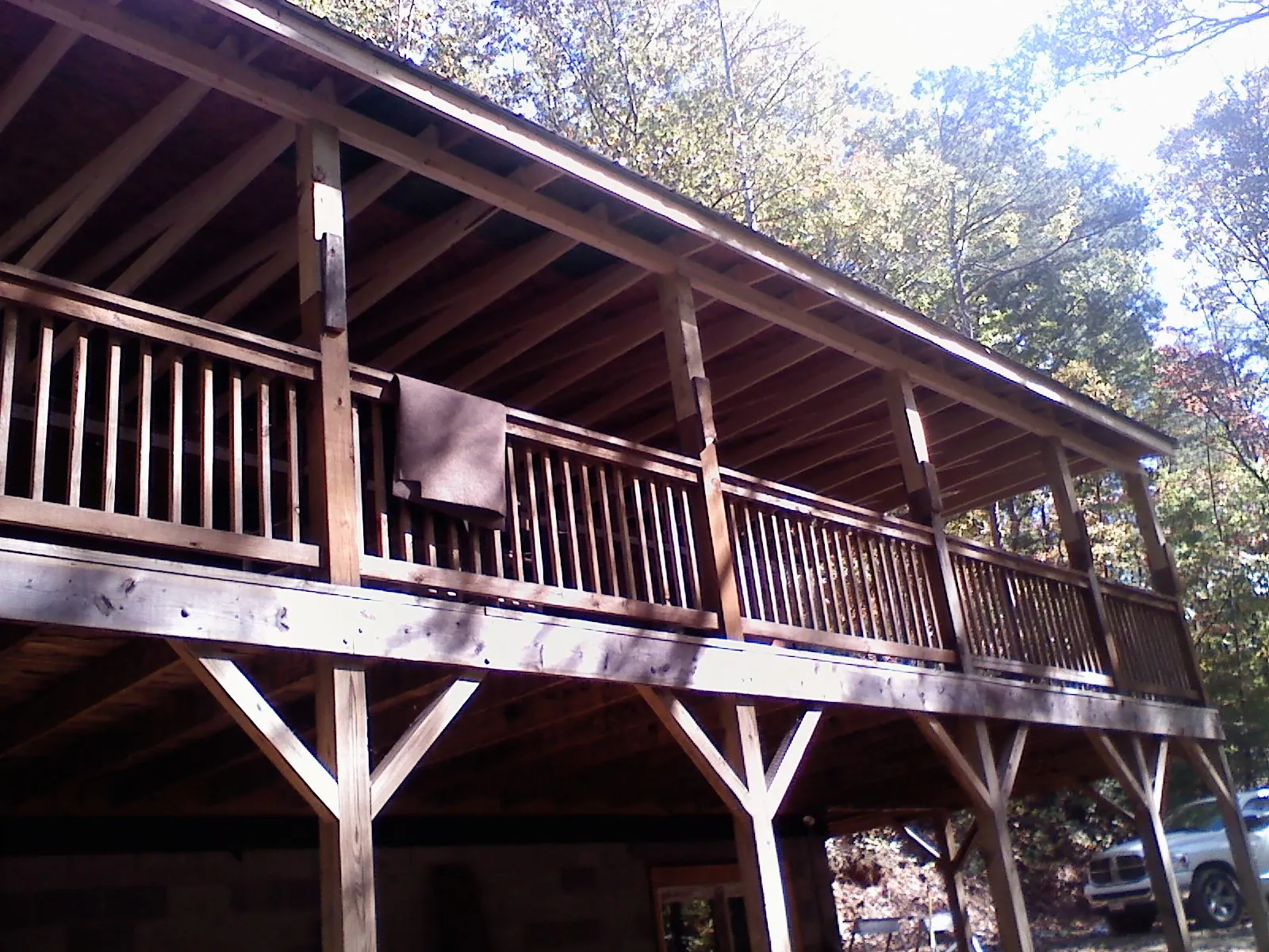 Timber framing under a new elevated porch and deck — Roof Leak Repair in Lakeshore by Roofing Brothers